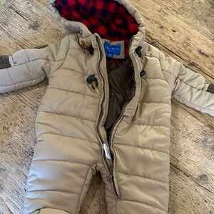 Tan Snowsuit with Red Plaid Lining.        F